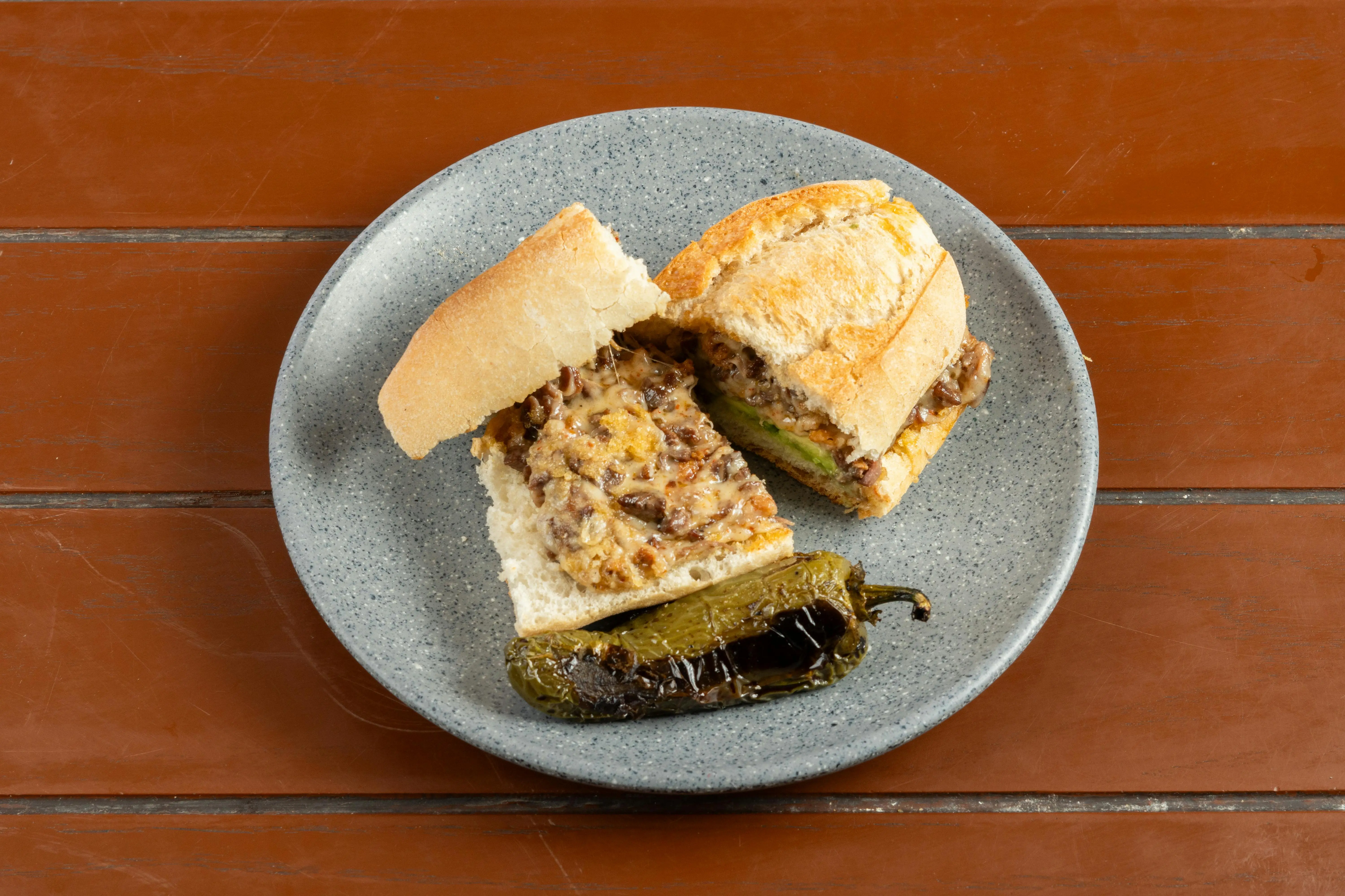 Signature Philly Cheesesteaks at Phat Boy Sherwood Park - ribeye steak sandwiches on fresh hoagie rolls